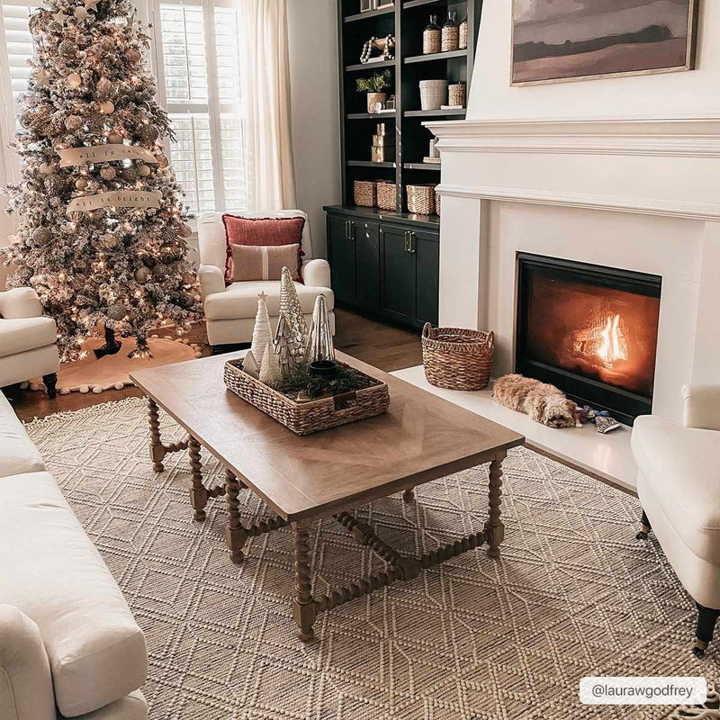 Hauteloom Ramsbury area rug with intricate geometric patterns in neutral tones, perfect for modern living spaces.