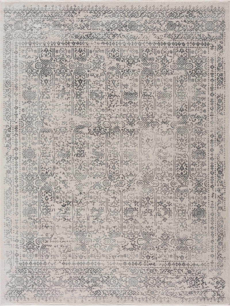 Hauteloom Michie area rug featuring intricate geometric patterns in neutral tones, ideal for adding style to living spaces.