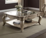 Chelmsford clear glass coffee table with beveled top and shelf, featuring taupe accents, by HouseOfZazla.
