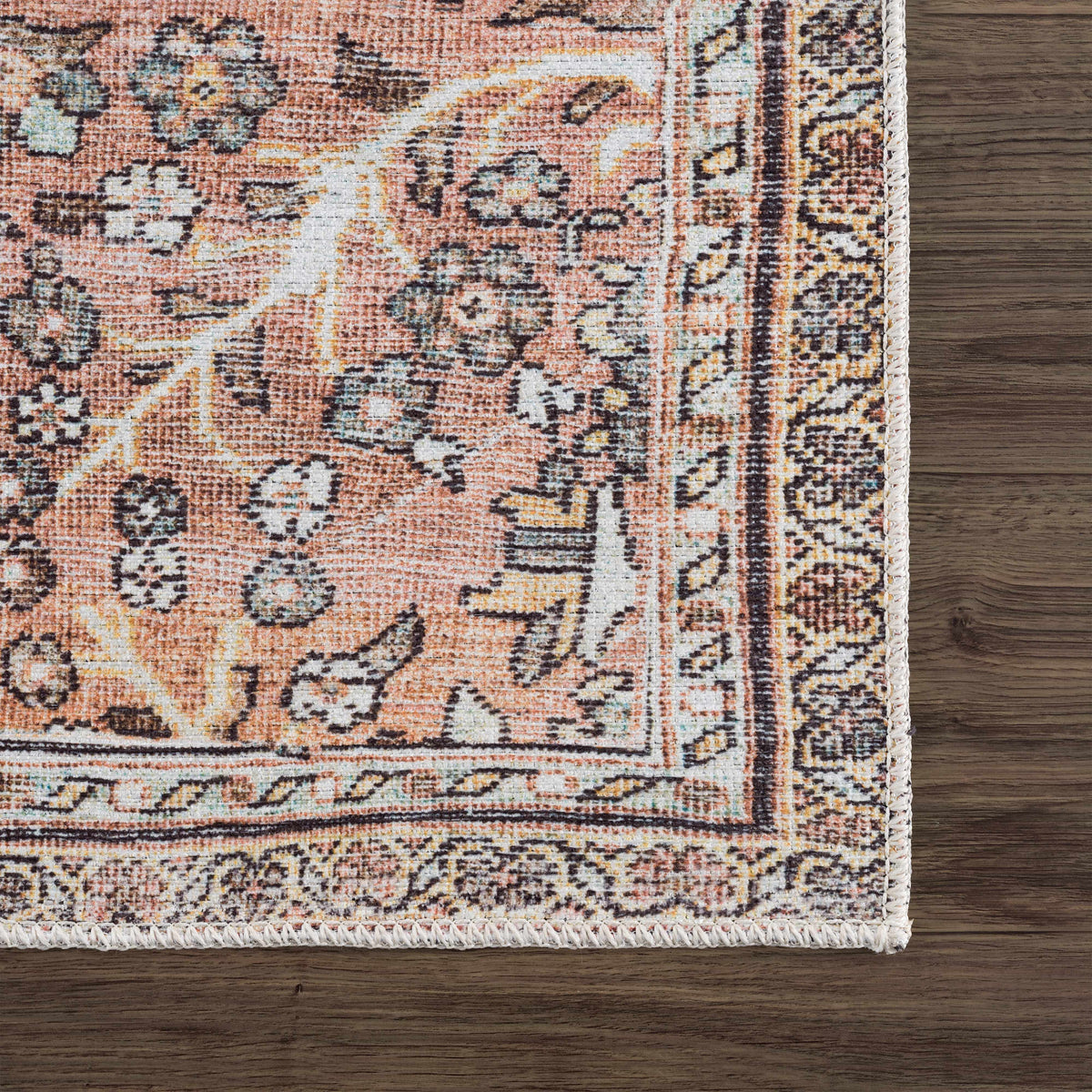 Hauteloom Urpi Rose and Brown washable area rug with floral pattern, soft texture, and vibrant colors for living room decor.