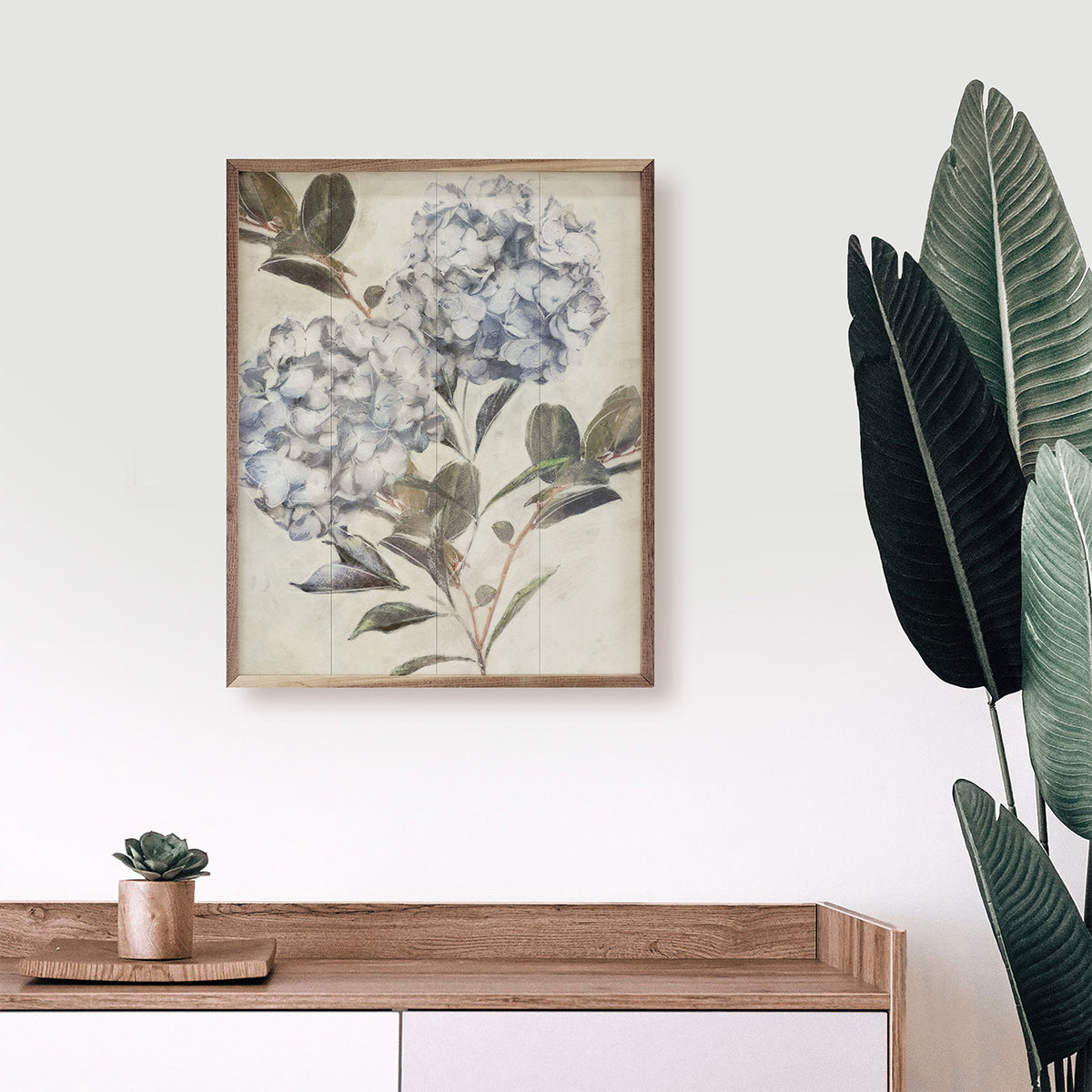 Walnut frame with Twilight Hydrangea 3 art by Nina Blue in 16x20 size, displayed in Kendrick Home interior.