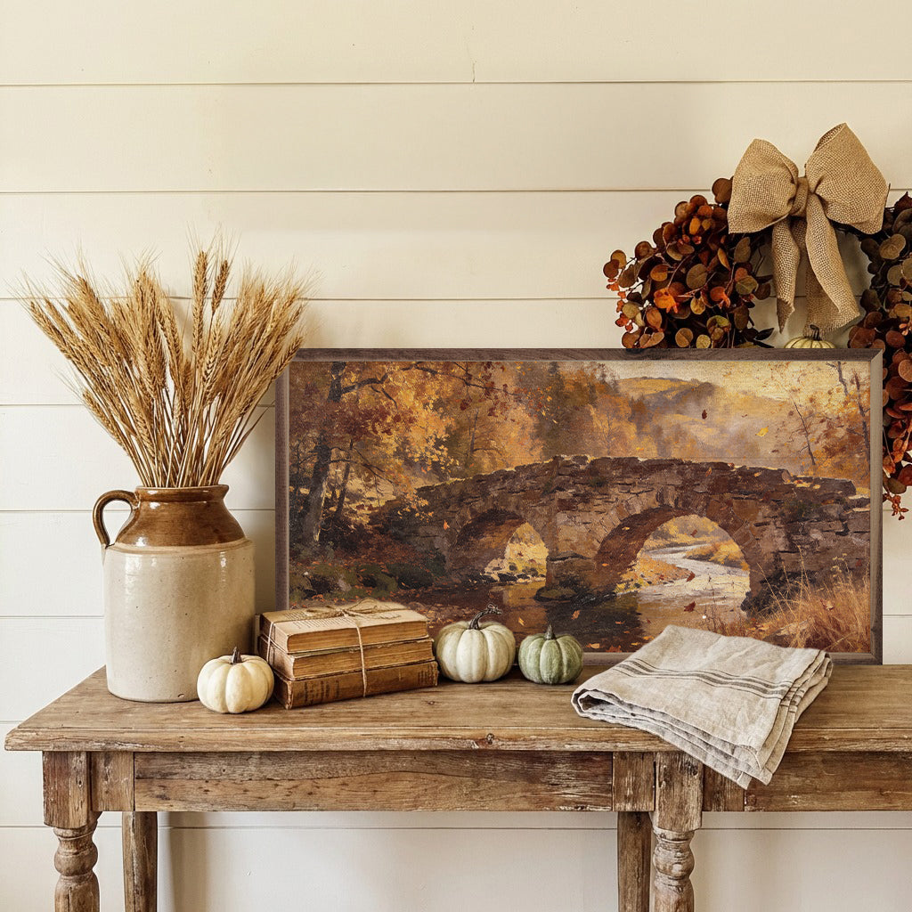 Walnut framed wall art titled "Stone Bridge In Autumn" depicting a scenic autumn landscape with a stone bridge and colorful trees.