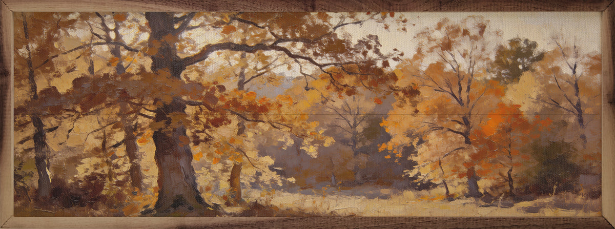 Walnut frame with autumn trees in golden light artwork by Kendrick Home, 24x8 inch wall decor emphasizing warm fall colors.