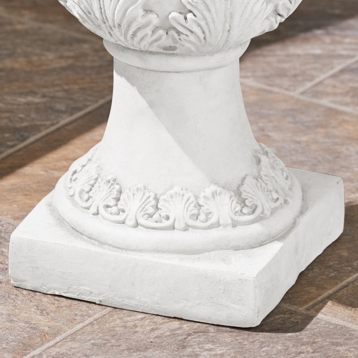 Roman style MGO garden urn planter with drainage hole in antique white, ideal for outdoor floral arrangements and garden decor.