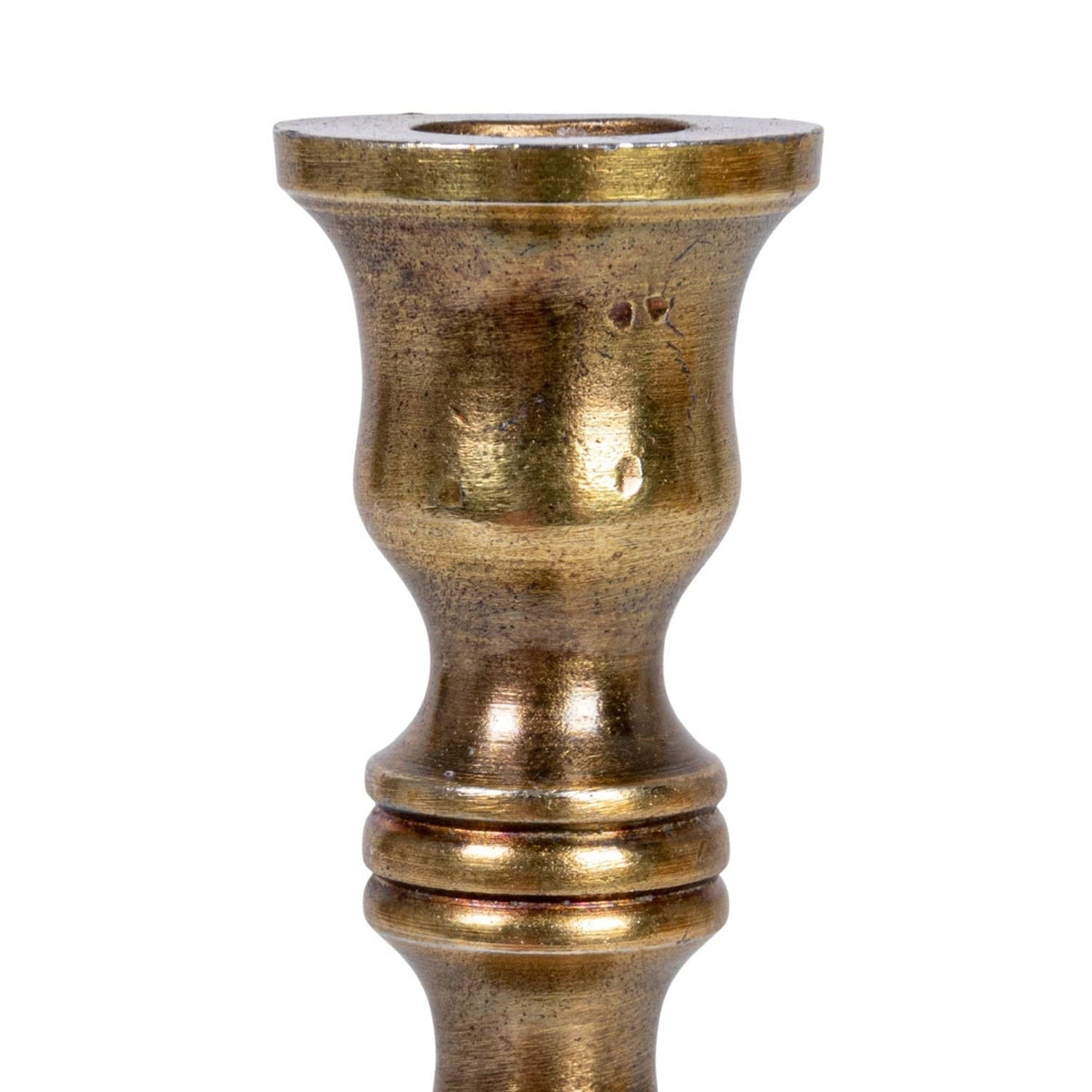 Antique brass taper candle holder made of cast aluminum for 1/2-inch candles, available in three sizes.