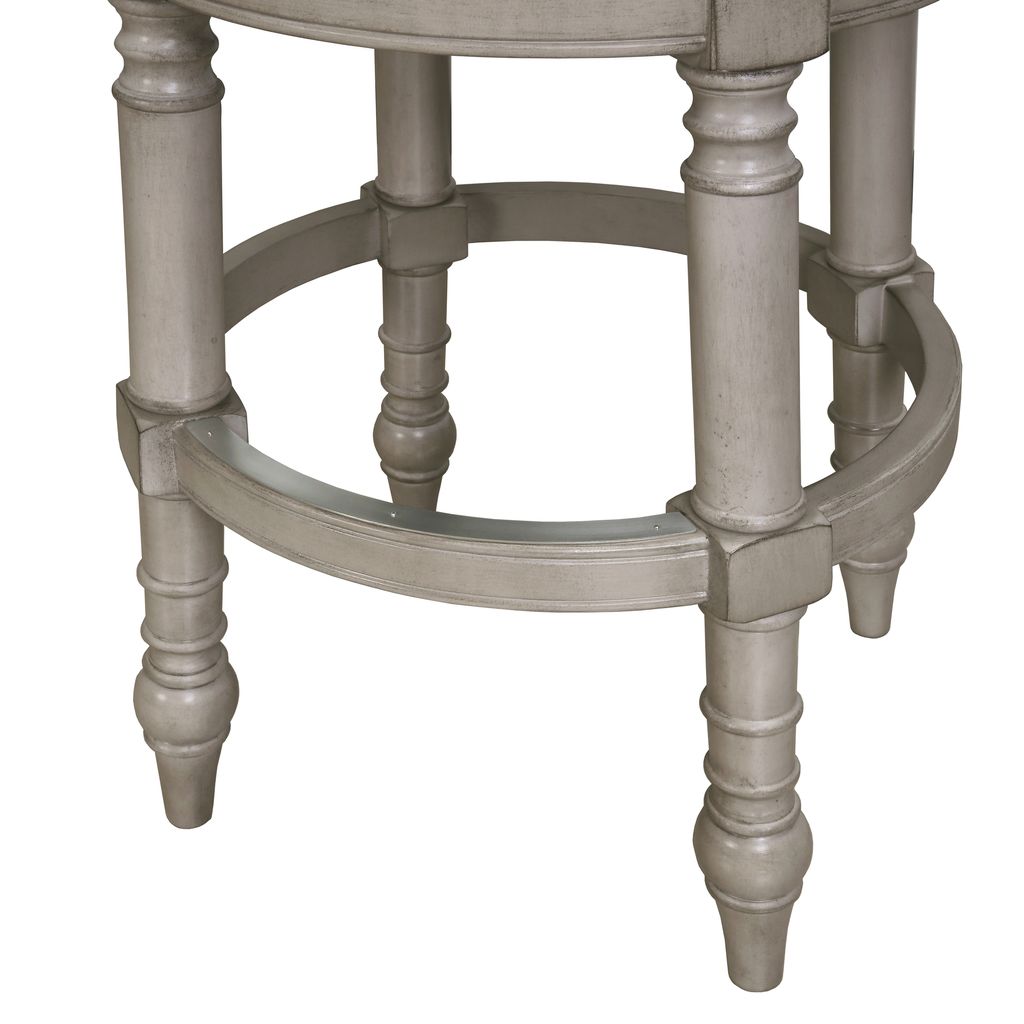 Close-up of Carolina Barstool Kitty Hawk swivel stool in Uptown Grey and beige fabric, showcasing its upholstered seat and modern design.