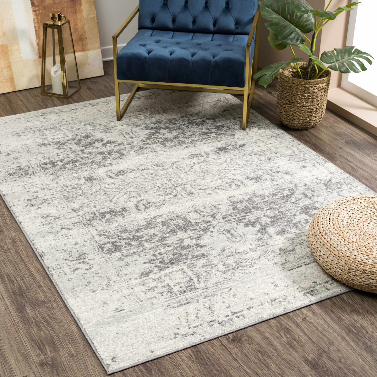 Hauteloom Rachel Area Rug with intricate pattern in neutral tones, showcasing soft woven texture and detailed design.
