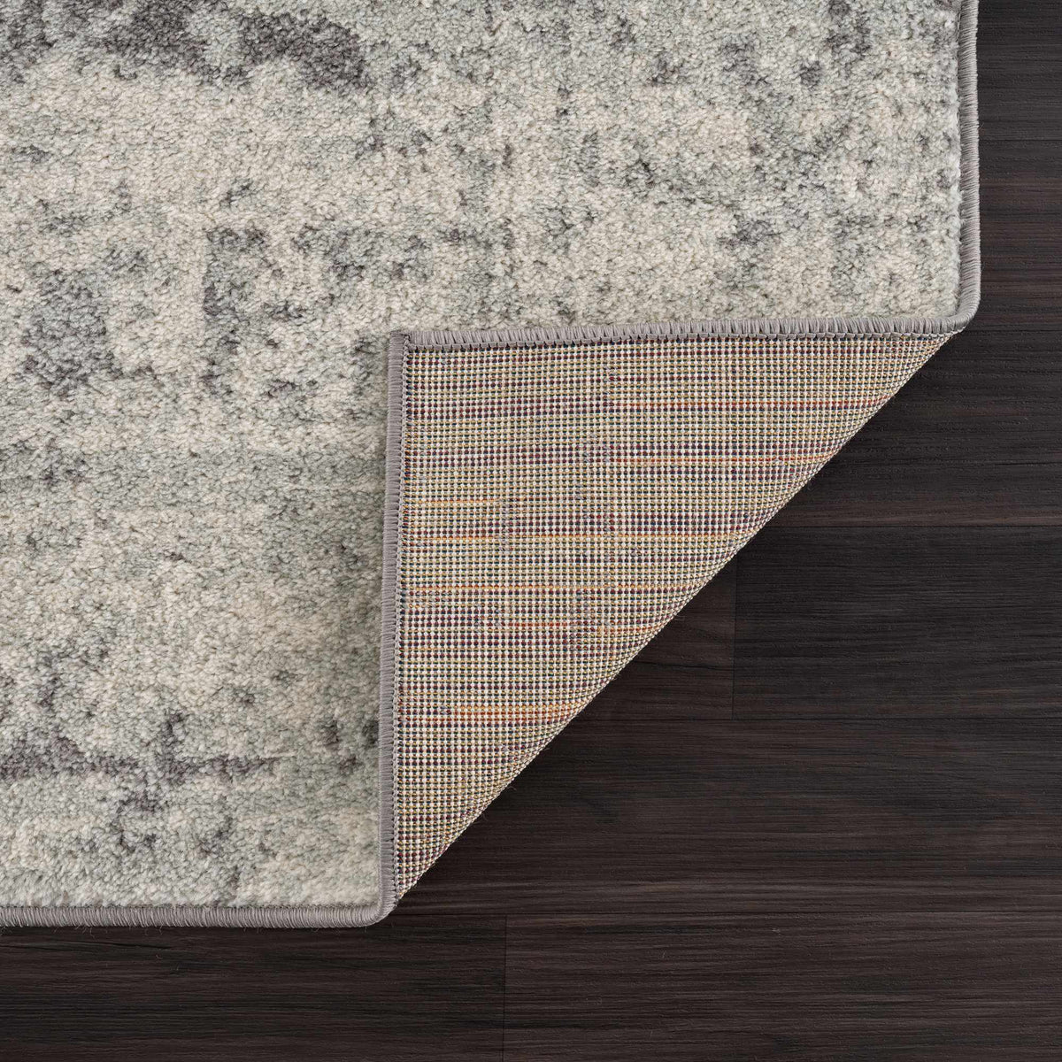 Hauteloom New Rachel area rug with intricate patterns and soft texture, displayed on a neutral background.