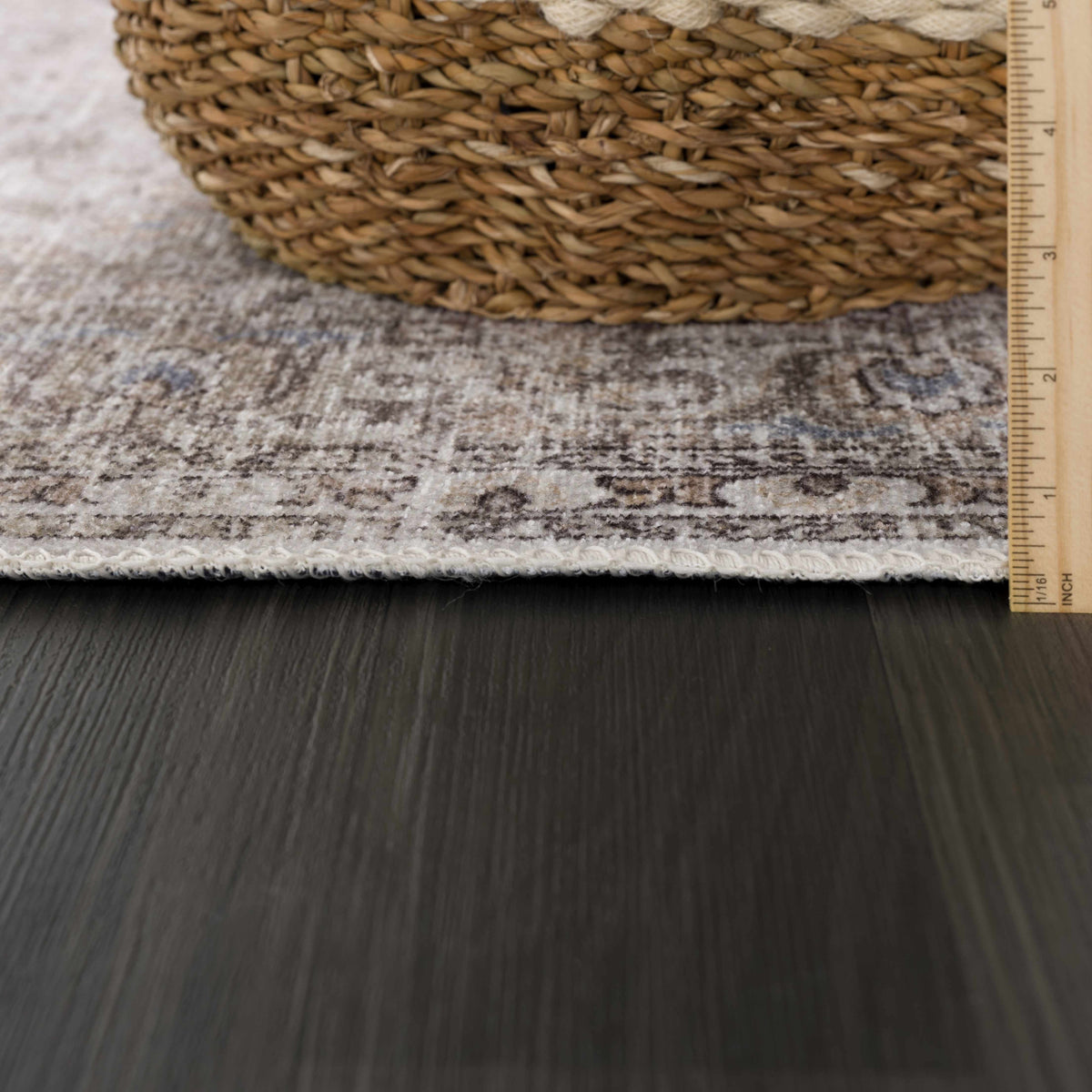 Cream washable area rug by Hauteloom with a soft, textured design suitable for living rooms or bedrooms.