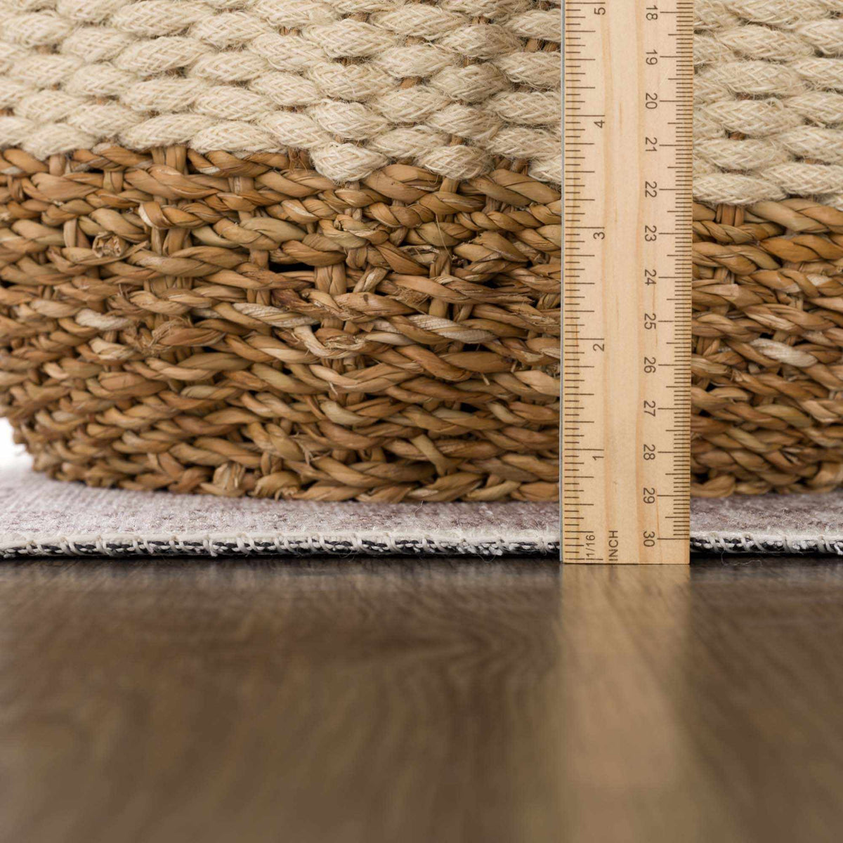 Cream washable area rug by Hauteloom with a textured pile, ideal for living rooms and bedrooms, shown in a cozy interior setting.