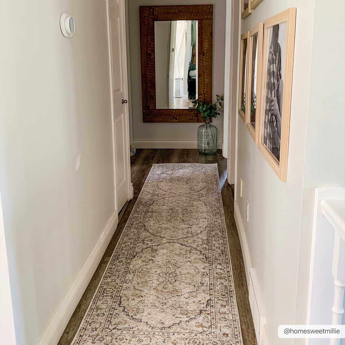 Cream washable area rug by Hauteloom, showcasing soft fabric and large 2.7 x 10.2-foot size, ideal for modern living spaces.