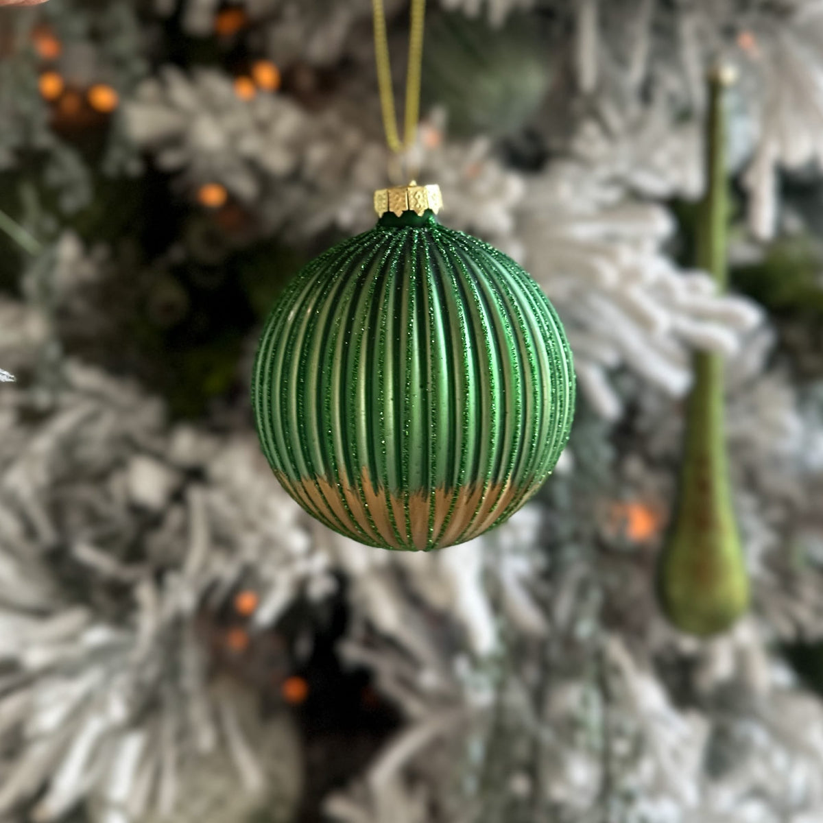 Green glitter ribbed glass Christmas ornament with gold bottom, 3.5 inches, festive holiday decor by Shop Holly J Home.