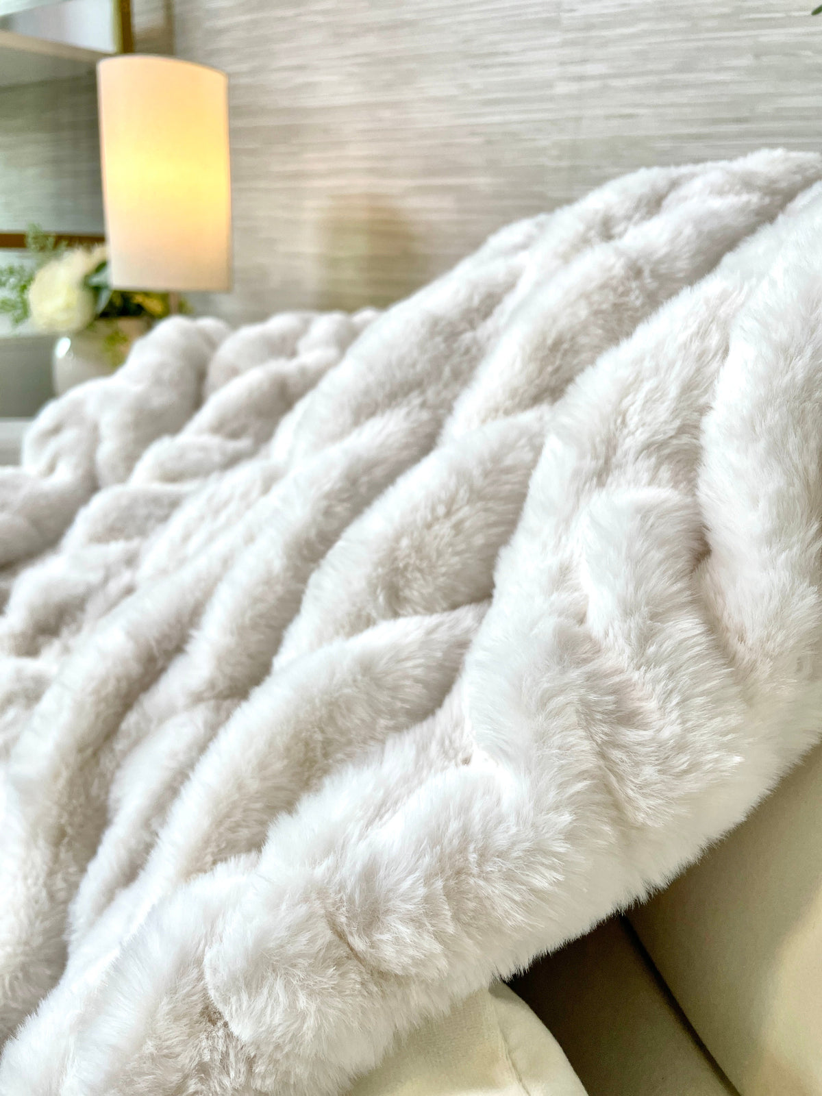 Ivory faux fur blanket by Cloud9, 30x40 inch lap-sized cozy throw with soft, plush texture for comfortable warmth.