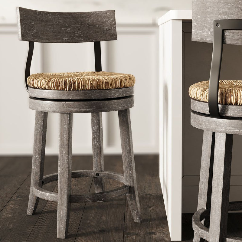 Gray Eden Stool with seagrass seat by Carolina Barstool, showcasing a stylish, modern furniture piece with natural woven detail.