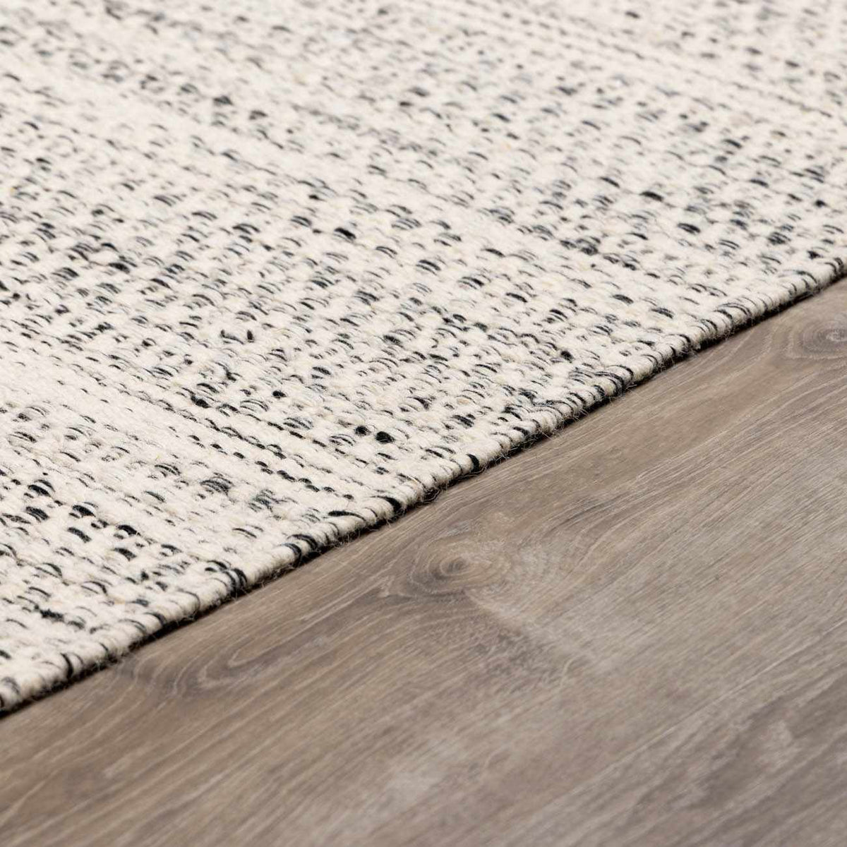 Hauteloom Williford Wool Area Rug with multicolored geometric pattern, soft pile, and modern design for living room decor.