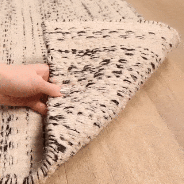 Williford wool area rug by Hauteloom featuring a textured, patterned design in neutral tones, perfect for living room or bedroom decor.