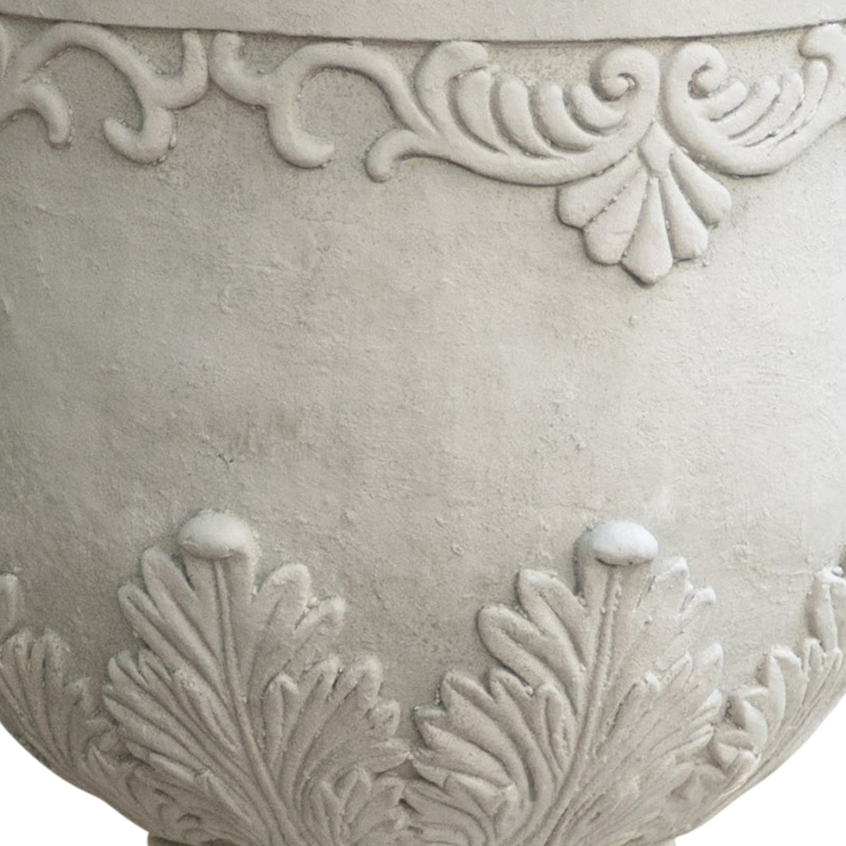 Antique white Moroccan urn planter made of durable magnesium oxide with decorative design, ideal for indoor or outdoor use.