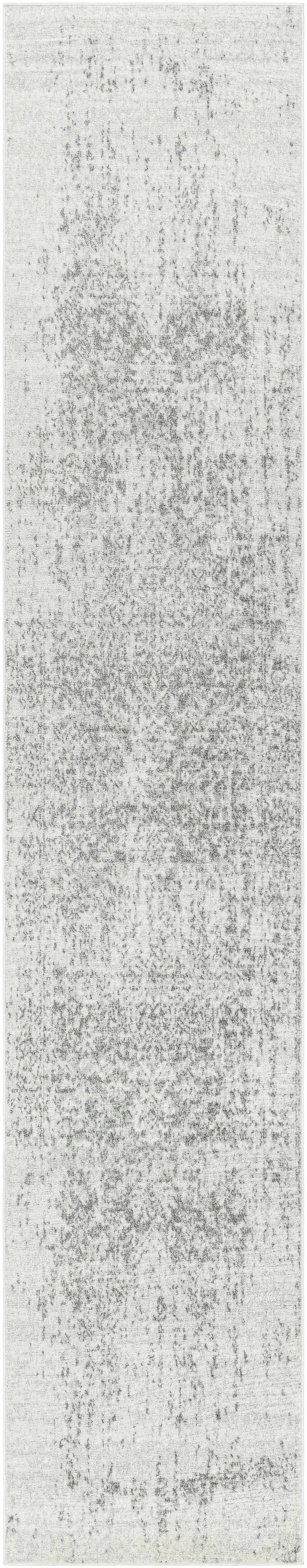 Hauteloom Rachel area rug with a modern geometric pattern in neutral tones, perfect for contemporary living spaces.