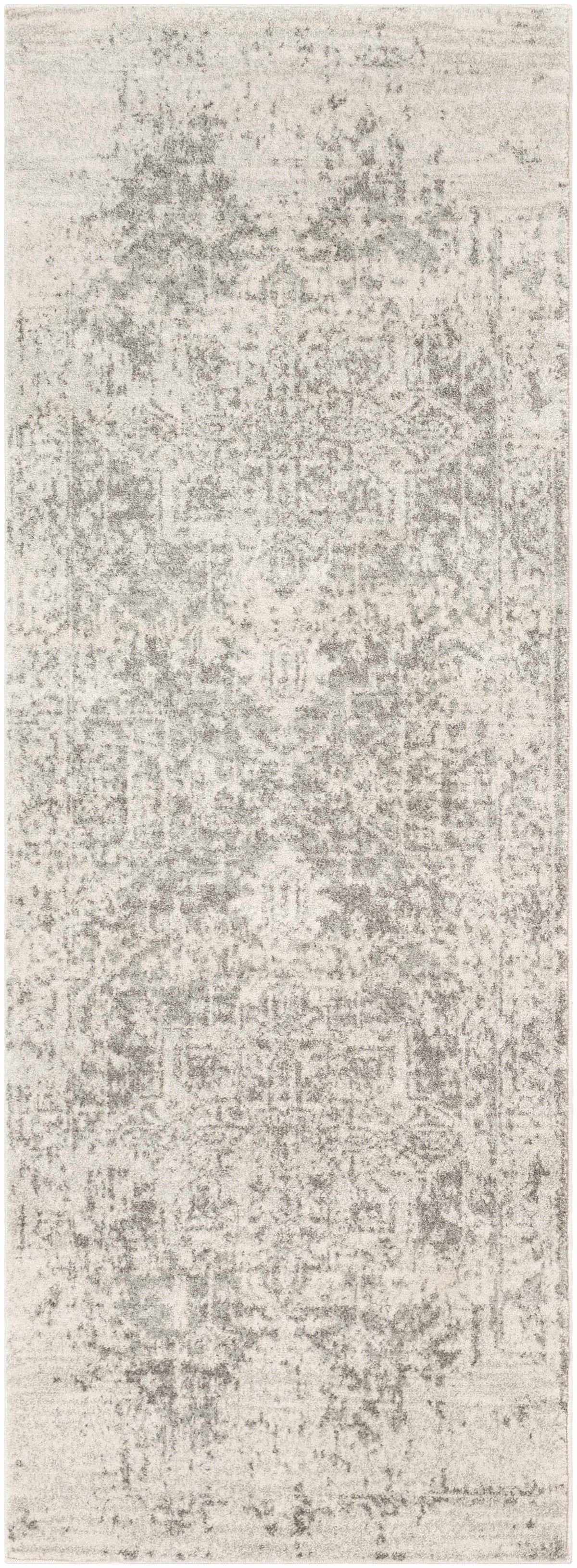 Hauteloom Rachel area rug with intricate geometric patterns in neutral tones, perfect for living room or bedroom decor.