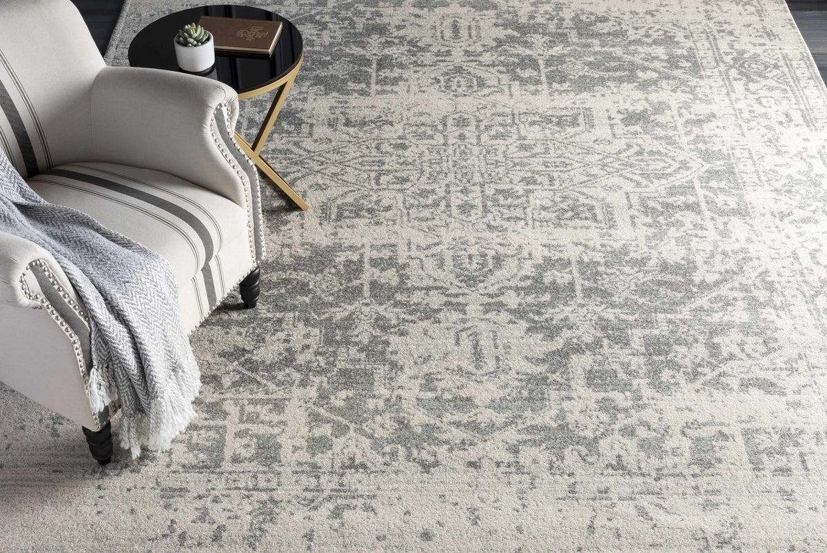 Hauteloom Rachel area rug with geometric pattern in neutral tones, soft textured fabric, and contemporary style for living room decor.