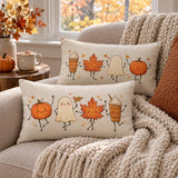 BlackbirdOak Autumn Friends lumbar pillow featuring pumpkin, ghost, and maple leaf fall decor for cozy seasonal décor.