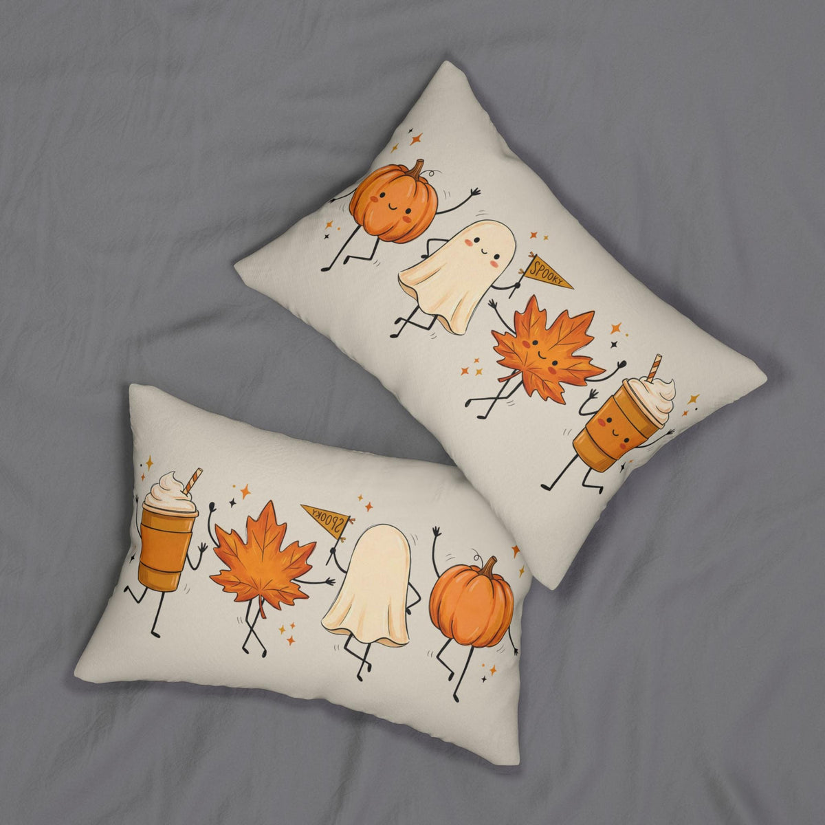 Autumn Friends lumbar pillow with pumpkin, ghost, and maple leaf fall design by BlackbirdOak on cozy fabric.