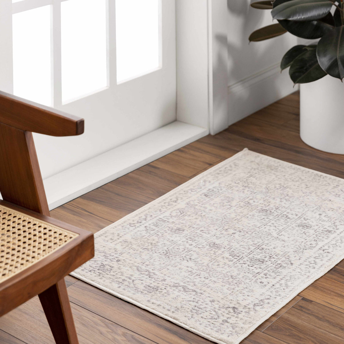 Hauteloom Michie area rug with intricate pattern in neutral tones, perfect for living room or bedroom decor.