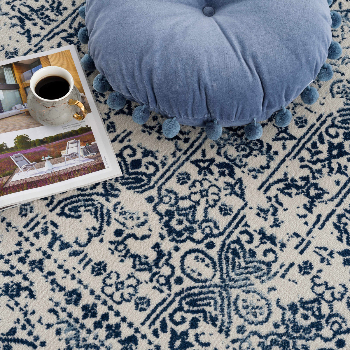 Hauteloom Michie Blue area rug with textured pile, vibrant blue color and soft surface, perfect for living or bedroom decor.