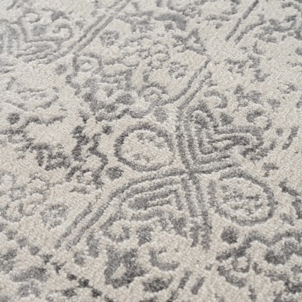 Hauteloom Michie area rug with textured pattern, showcasing soft, woven fabric in neutral tones for cozy home decor.