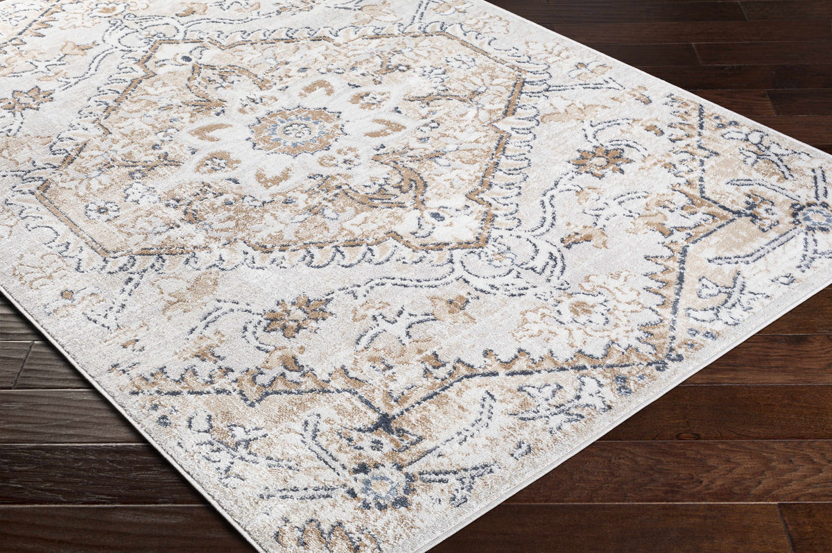 Corner view of Hauteloom Mudgee Area Rug showcasing intricate patterns and warm earthy tones in a stylish rug design.