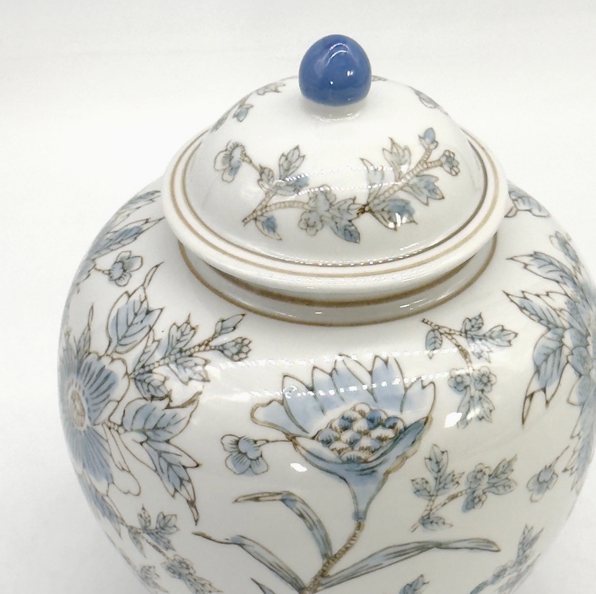 White and blue ceramic Chinoiserie floral vase, 10-inch decorative jar with intricate floral patterns.